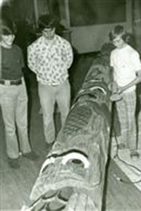 black and white photo of 1973 students working on totem pole
